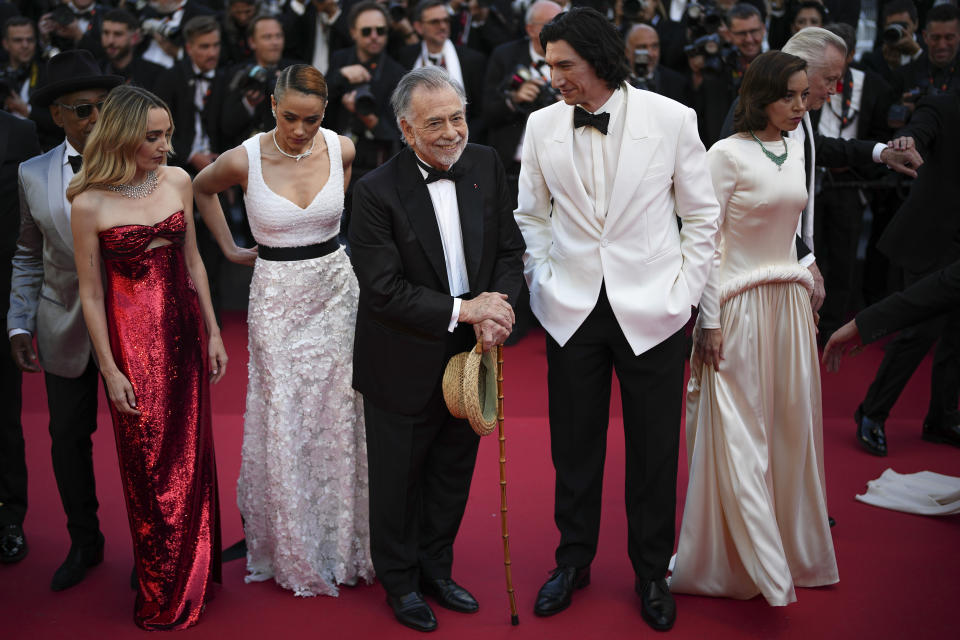 Giancarlo Esposito, from left, Chloe Fineman, Nathalie Emmanuel, director Francis Ford Coppola, Adam Driver, Aubrey Plaza and Jon Voight pose for photographers upon arrival at the premiere of the film 'Megalopolis' at the 77th international film festival, Cannes, southern France, Thursday, May 16, 2024. (Photo by Daniel Cole/Invision/AP)