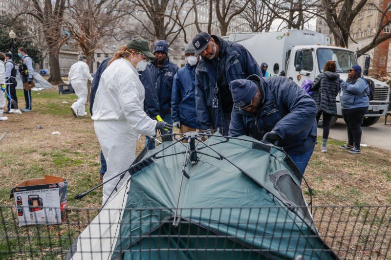 Workers from the National Park Service clear out a homeless encampment at the McPherson Square Park on Feb. 15 in Washington D.C. File photo by Jemal Countess/UPI