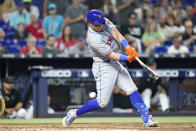 New York Mets' James McCann strikes out swinging during the ninth inning of a baseball game against the Miami Marlins, Sunday, June 26, 2022, in Miami. (AP Photo/Lynne Sladky)