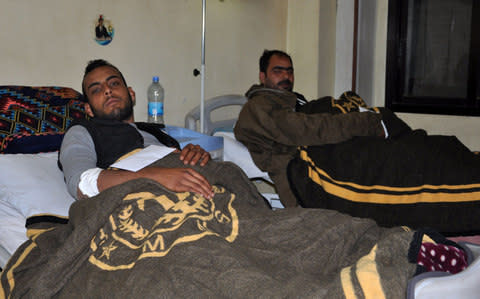 Bashad regime soldiers wounded in the US strikes near Deir Ezzor are seen in a hospital last week - Credit: AFP/Getty Images