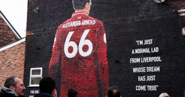 A mural of Liverpool&#39;s Trent Alexander-Arnold on the side of a house near Anfield. Credit: Alamy