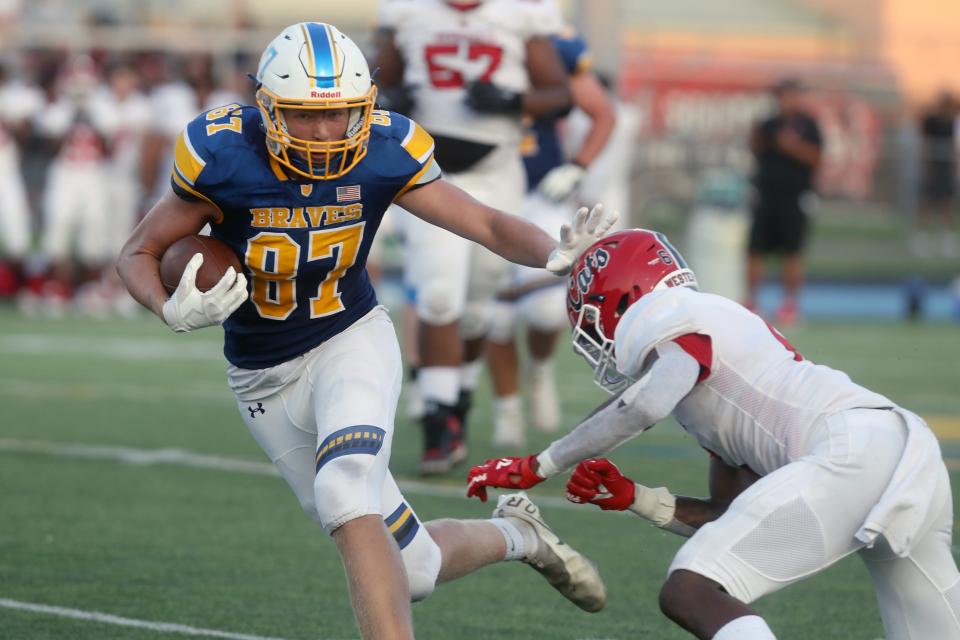 Olentangy's Gavin Grover fends off Westerville South's Javi'er Wills during a game Aug. 20, 2021, at Olentangy High School in Lewis Center, Ohio.