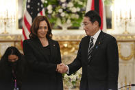 FILE - U.S. Vice President Kamala Harris, left, and Japan's Prime Minister Fumio Kishida shake hands before the Japan-U.S. bilateral meeting at the Akasaka Palace state guest house in Tokyo, Sept. 26, 2022. Harris is trying to bolster relations between Japan and South Korea to present a united front to growing Chinese influence, but tension and bad relations between the two countries are not helping. (David Mareuil/Pool Photo via AP, File)