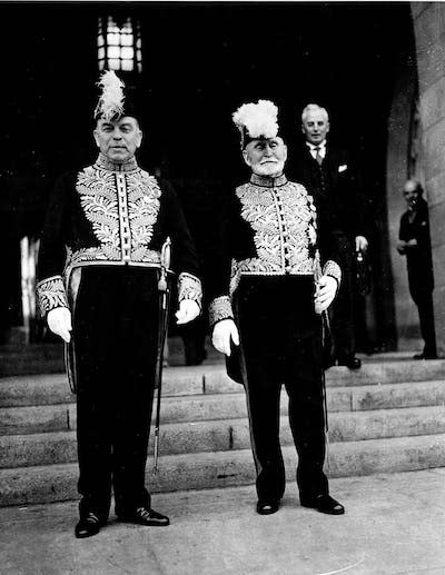 Prime Minister William Lyon Mackenzie King, left, and Sen. Raoul Dandurand in Ottawa during a 1939 Royal visit. (CP PHOTO via National Archives)