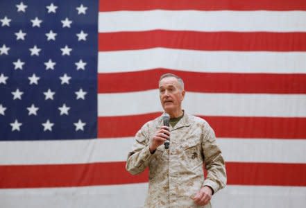 Gen. Joseph Dunford, chairman of the Joint Chiefs of Staff, speaks during celebrations on Christmas Eve at a U.S. airfield in Bagram, north of Kabul, Afghanistan December 24, 2017. REUTERS/Mohammad Ismail