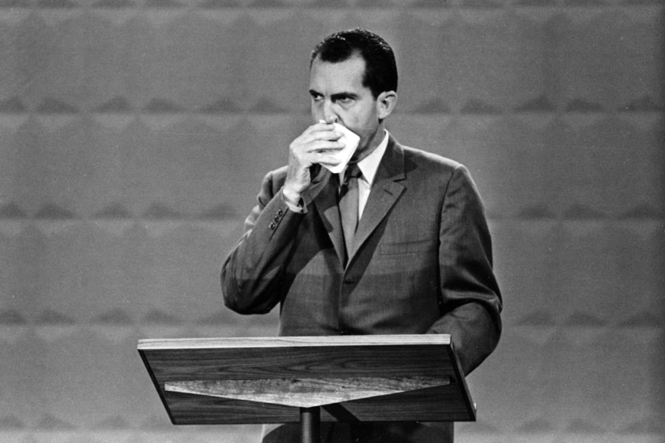 A landmark TV moment: Vice President Richard M. Nixon wipes his face with a handkerchief during  his awkward debate with Sen. John F. Kennedy in Chicago on Sept. 26, 1960.  