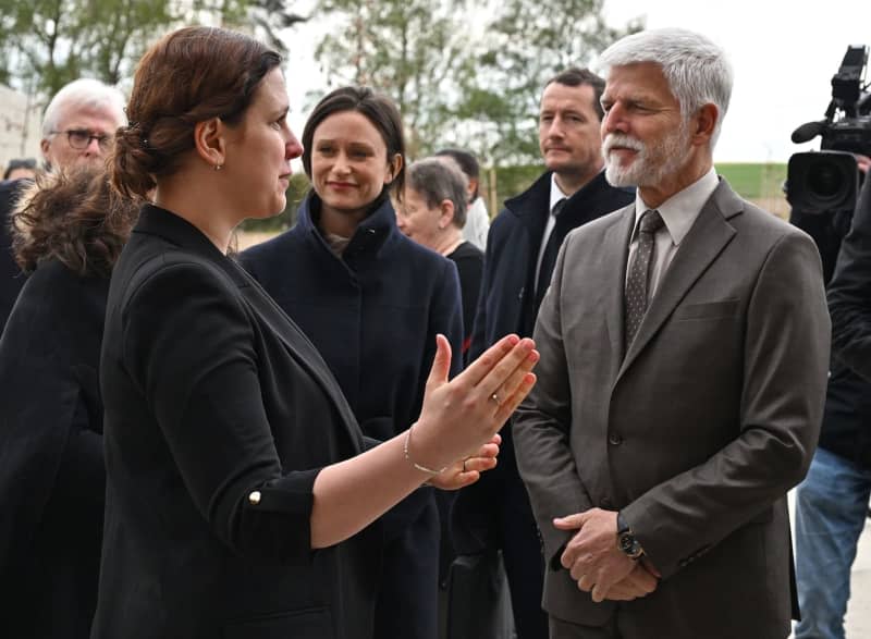 (L-R) co-author of the exhibition scenarios Anna Mikova, Deputy Foreign Minister of Norway Maria Varteressianova and Czech President Petr Pavel at the opening of the Holocaust Memorial to Roma and Sinti in Bohemia. Pavlíèek Luboš/CTK/dpa