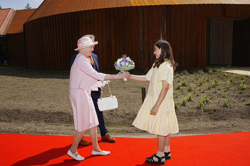 CORRECTS SPELLING OF NAME The Danish Queen Margrethe arrives at the inauguration of the new museum FLUGT in Oksboel, Denmark, on Saturday 25 June 2022. Flugt — Refugee Museum of Denmark was created on the site of a camp in Oksboel, a town in southwestern Denmark, that housed up to 100,000 refugees from Germany in the postwar years. Flugt — which means escape in Danish — also tells the story of immigrants from Iran, Lebanon, Hungary, Vietnam and elsewhere who fled their homelands and found shelter in the Scandinavian country. (Bo Amstrup/Ritzau Scanpix via AP)