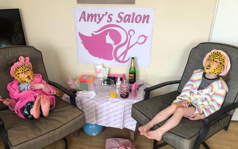 And relax: birthday girl Amy, 7, and little sister Summer, 4, relaxing in Amy's Salon  - Charlene Casey 