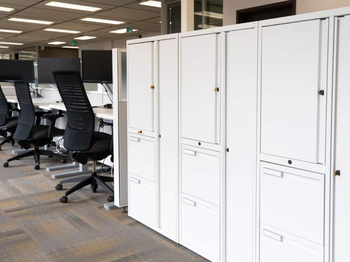 Public Services and Procurement Canada has a strategy to 'modernize' federal offices, and intends to have 25 per cent upgraded by 2026. Desks are unassigned, and employees store belongings in lockers.  (Supplied by Public Services and Procurement Canada - image credit)