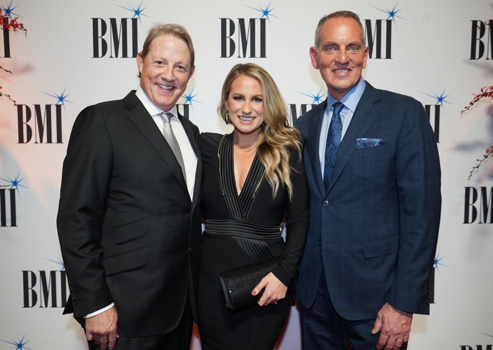 BMI Vice President Creative Clay Bradley, Caitlyn Smith and BMI President and CEO Mike O'Neill attend the 2022 BMI Country Awards at BMI on November 08, 2022, in Nashville, Tennessee.