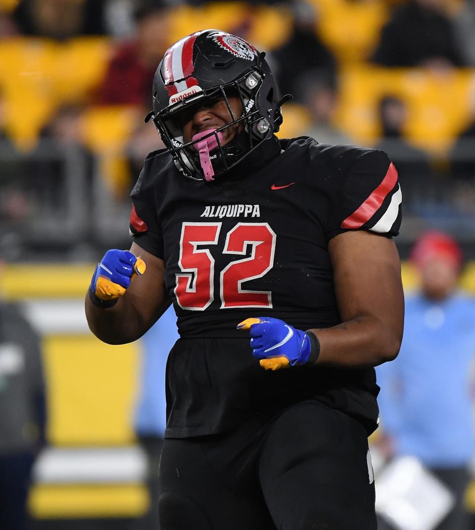 Neco Eberhardt #52 of the Aliquippa Quips reacts after a defensive stop in the first half during the WPIAL Class 4A championship game against the Central Valley Warriors at Acrisure Stadium on November 25, 2022 in Pittsburgh, Pennsylvania.