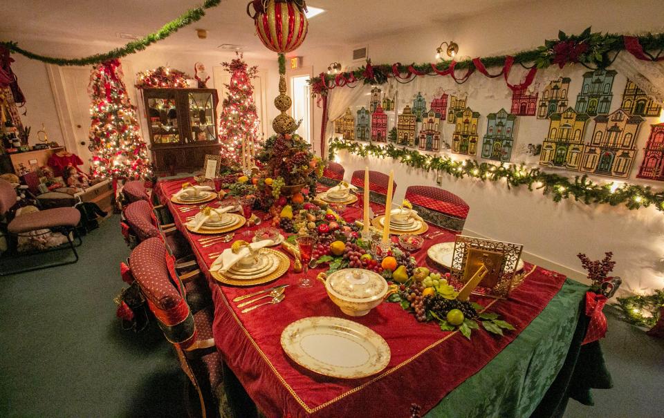 A grand Christmas table at the Sheboygan County Historical Research Center’s Treemendous Celebration holiday display as seen, Wednesday, November 30, 2022, in Sheboygan Falls, Wis.