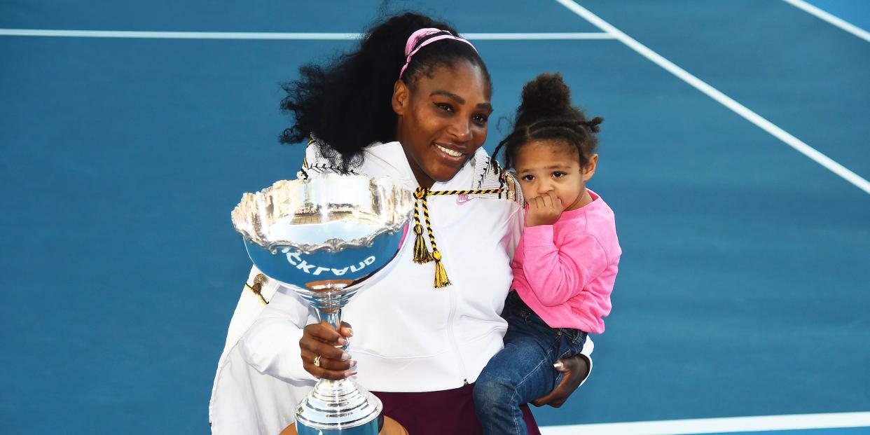 Serena Williams from the United States with daughter Alexis Olympia Ohanian Jr. and the ASB trophy after winning her singles finals match against United States Jessica Pegula at the ASB Classic in January 2020.