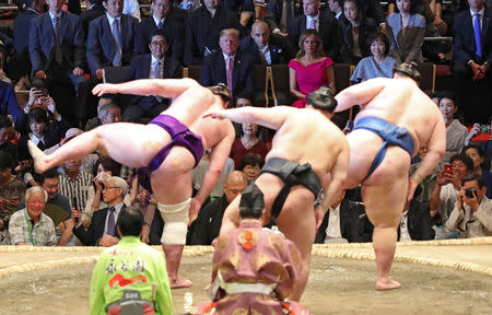 U.S. President Donald Trump, first lady Melania Trump, Japanese Prime Minister Shinzo Abe and wife Akie Abe watch the Summer Grand Sumo Tournament at Ryogoku Kokigikan Sumo Hall in Tokyo, Japan May 26, 2019. REUTERS/Jonathan Ernst