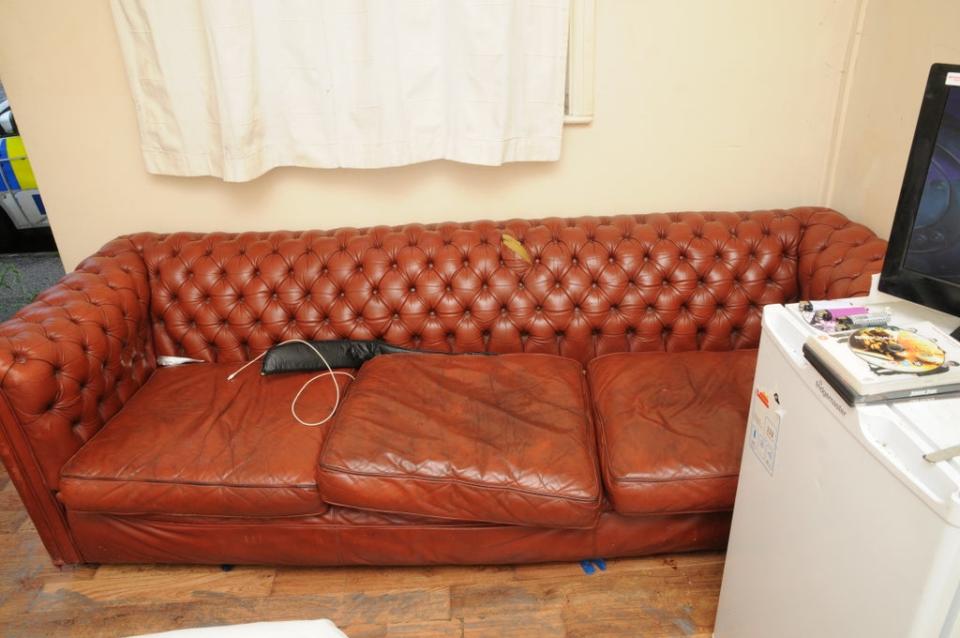 Searches of the hostel in Ipswich led to the nunchucks and a sword (seen here on the sofa) used to threaten the victim being recovered (Suffolk Constabulary)