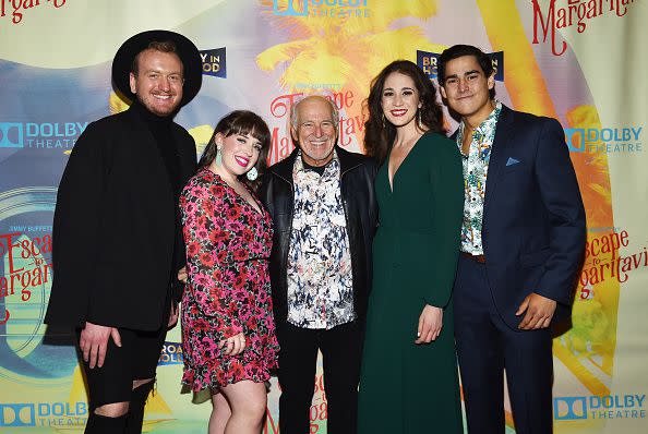 HOLLYWOOD, CALIFORNIA - FEBRUARY 18: Musician Jimmy Buffett (C) and cast members arrive at Jimmy Buffett's 