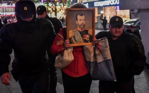 Police detain a protester at the October premiere of Matilda, a controversial film about Nicholas II's romance with a ballerina. - Credit: Kirill Kurdyavtsev/AFP/Getty Images