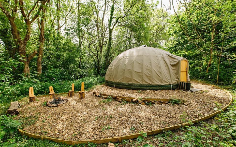 Activites at Penhein include building shelters and toasting homemade campfire bread