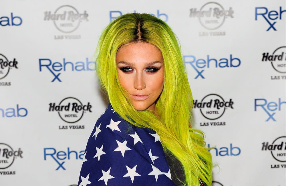 Kesha - JULY 2015 - GETTY - Hard Rock Hotel and Casino Rehab pool party