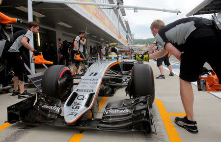 Formula One - Russian Grand Prix - Sochi, Russia - 30/4/16 - Force India Formula One driver Sergio Perez of Mexico sits in his car during the third practice session. REUTERS/Maxim Shemetov