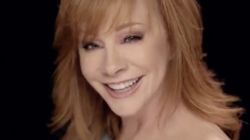 Reba McEntire smiling into the camera