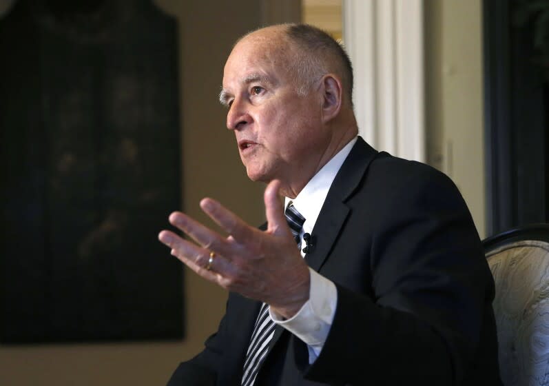 FILE - In this Tuesday, Dec. 18, 2018 file photo, then California Gov. Jerry Brown talks during an interview in Sacramento, Calif. Former Gov. Jerry Brown twice vetoed bills to curb the exploding practice of mandatory arbitration (AP Photo/Rich Pedroncelli, File)