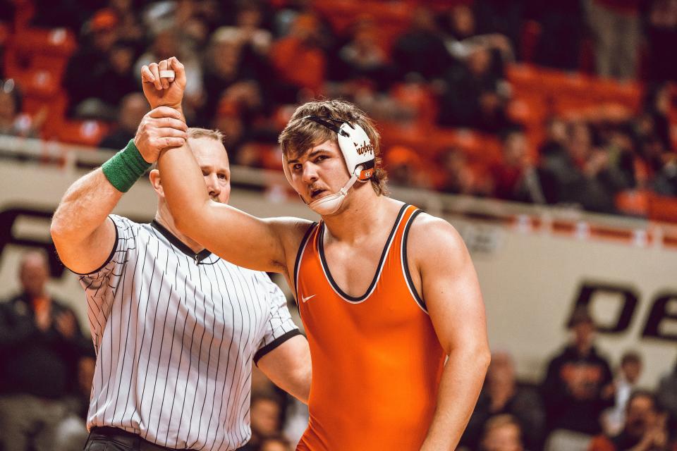 Oklahoma State's Luke Surber was a three-time state champion at Tuttle High School.