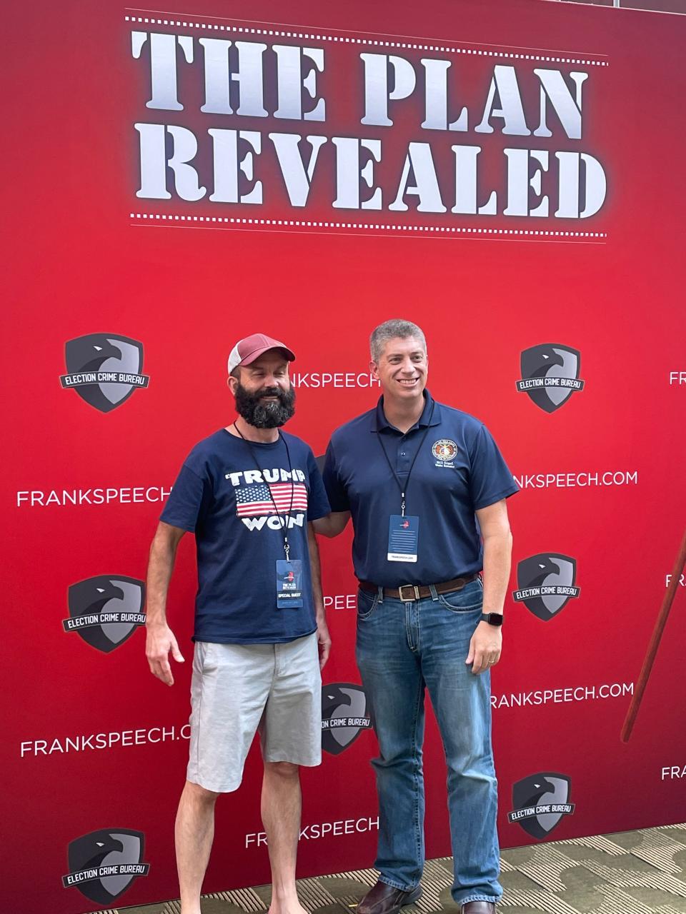 Bill Eigel, a Republican candidate in Missouri's 2024 gubernatorial race, poses for a photo with an attendee at the Mike Lindell Election Crime Bureau Summit in Springfield, MO on Aug. 16, 2023.