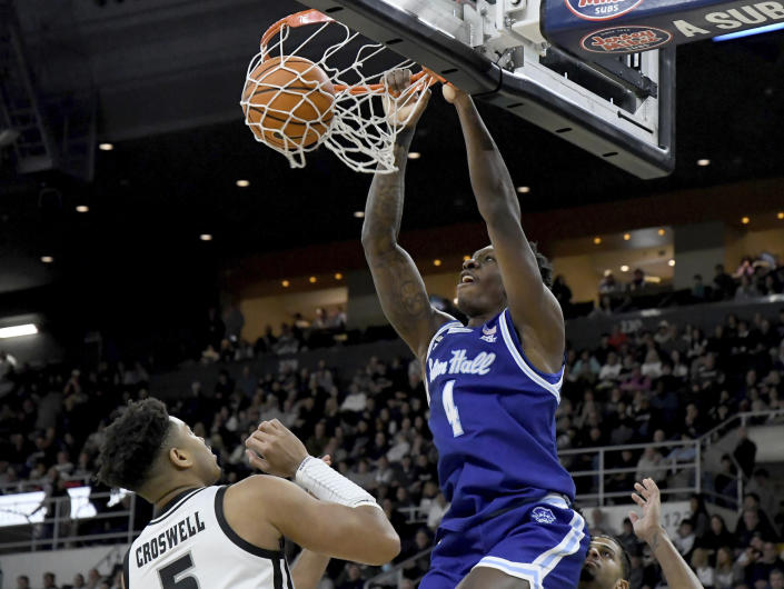 Seton Hall forward Tyrese Samuel (4) dunks the ball during the first half of an NCAA college basketball game against Providence, Saturday, March 4, 2023, in Providence, R.I. (AP Photo/Mark Stockwell)