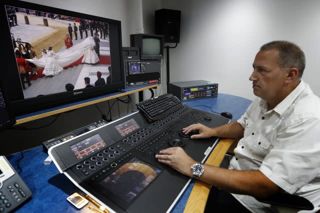 Footage of Charles and Diana's wedding on a monitor