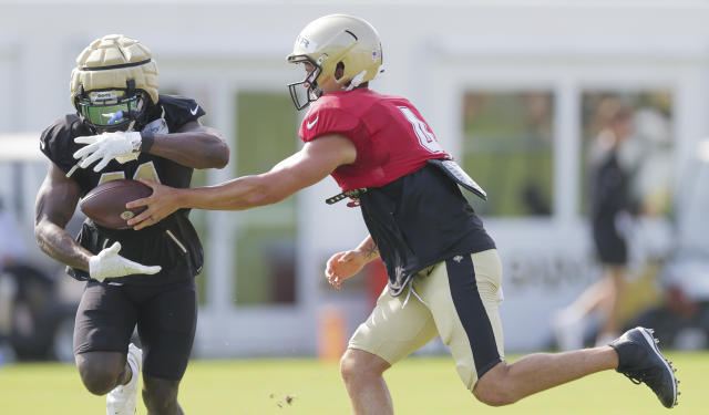 Alvin Kamara of the New Orleans Saints runs with the ball against