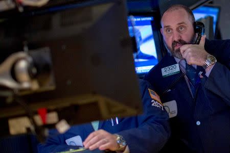 Traders work on the floor of the New York Stock Exchange September 16, 2014. REUTERS/Brendan McDermid