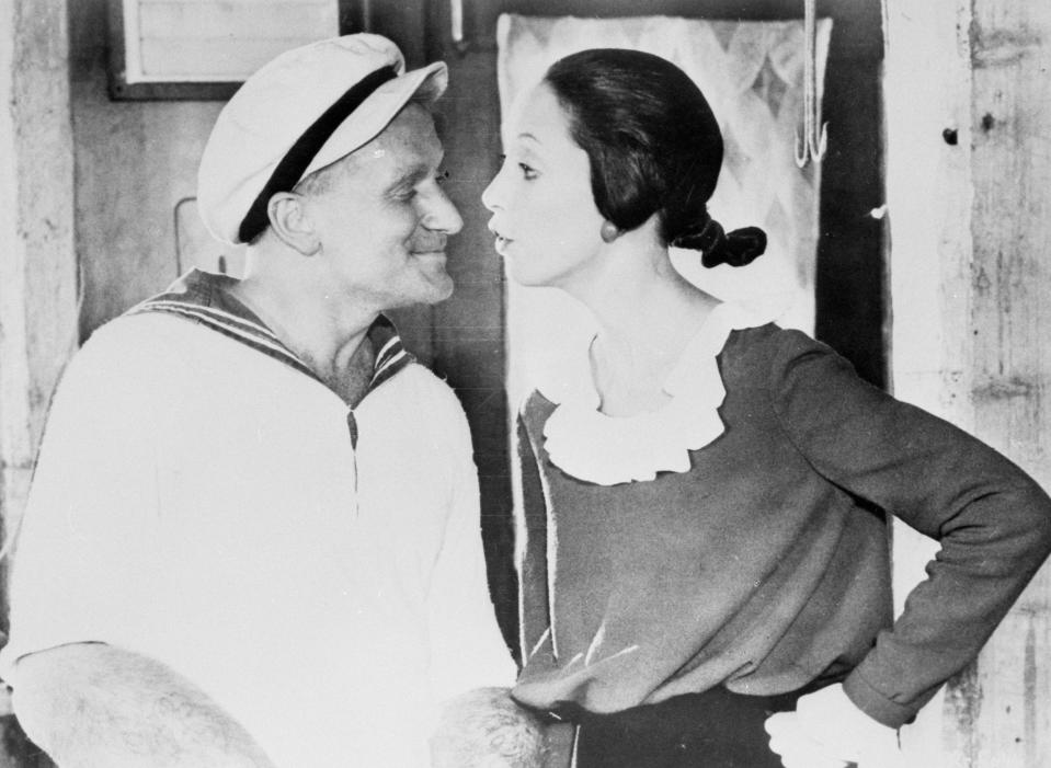 Comedy actor Robin Williams, as Popeye, and Shelley Duvall as Olive Oil. They star in the film adaptation of the famous comic strip, which opens at the Odeon in Leicester Square, London, tonight.   (Photo by PA Images via Getty Images)