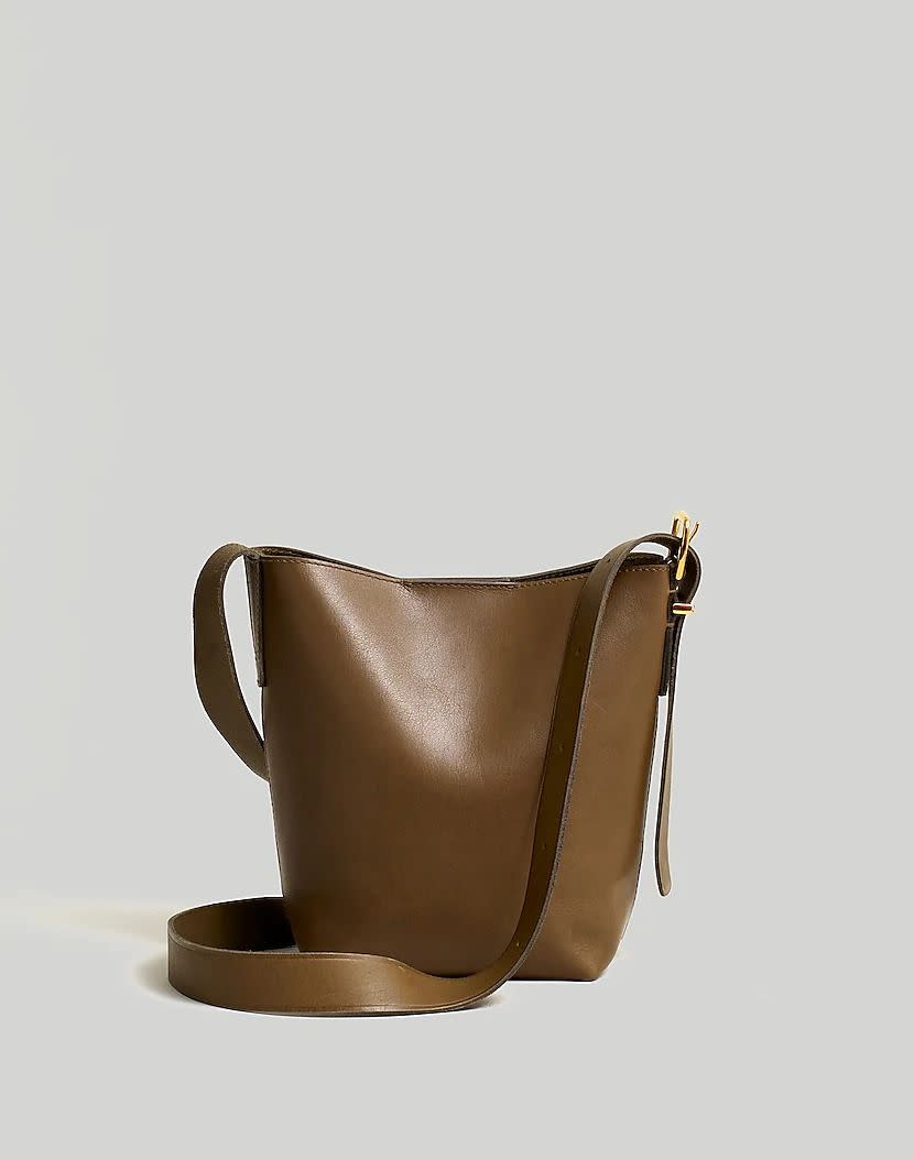 <p><a href="https://go.redirectingat.com?id=74968X1596630&url=https%3A%2F%2Fwww.madewell.com%2Fthe-essential-mini-bucket-tote-in-leather-NN397.html&sref=https%3A%2F%2Fwww.thepioneerwoman.com%2Ffashion-style%2Fg46330985%2Fbest-crossbody-bags%2F" rel="nofollow noopener" target="_blank" data-ylk="slk:Shop Now;elm:context_link;itc:0;sec:content-canvas" class="link ">Shop Now</a></p><p>The Essential Mini Bucket Tote</p><p>madewell.com</p><p>$138.00</p><span class="copyright">Madewell</span>
