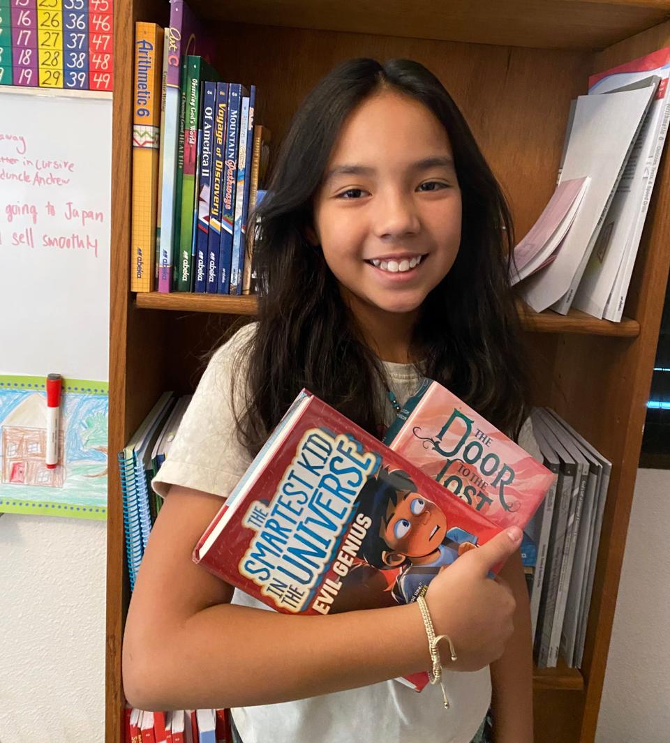 Jewel Love Jackson, 11, read over 60 books this summer and was the grand prize winner in the Music Compound's Rock Your Summer Reading initiative.