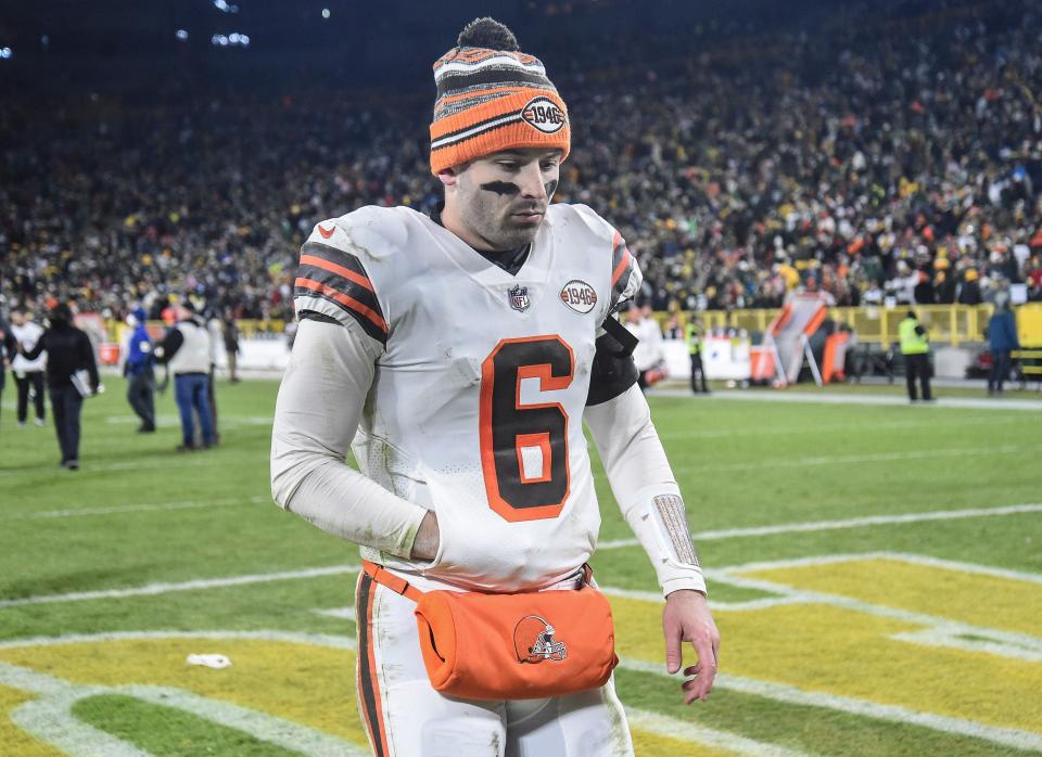 Cleveland Browns quarterback Baker Mayfield walks off the field after the Browns&#39; loss to the Green Bay Packers at Lambeau Field.