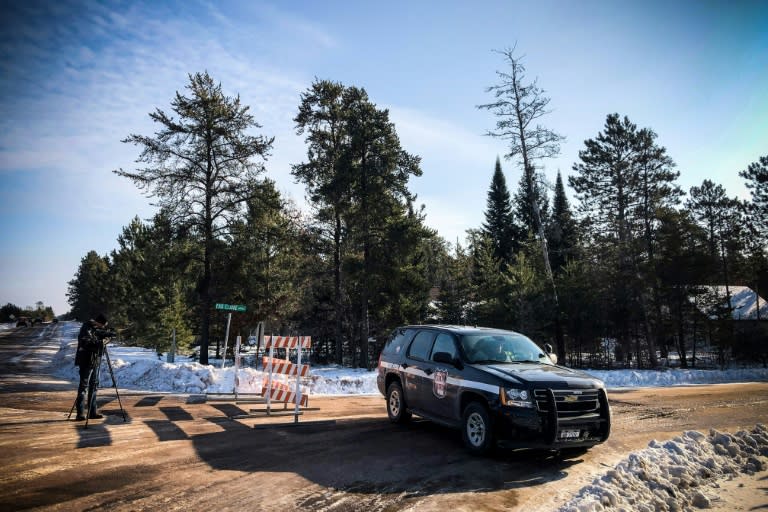 A police car blocks the road where teenager Jayme Closs was found on January 11, 2019 in Gordon, Wisconsin