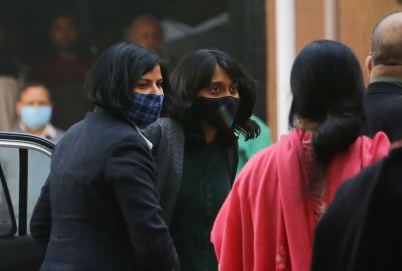 Disha Ravi, a 22-year-old climate activist, arrives to a court in New Delhi