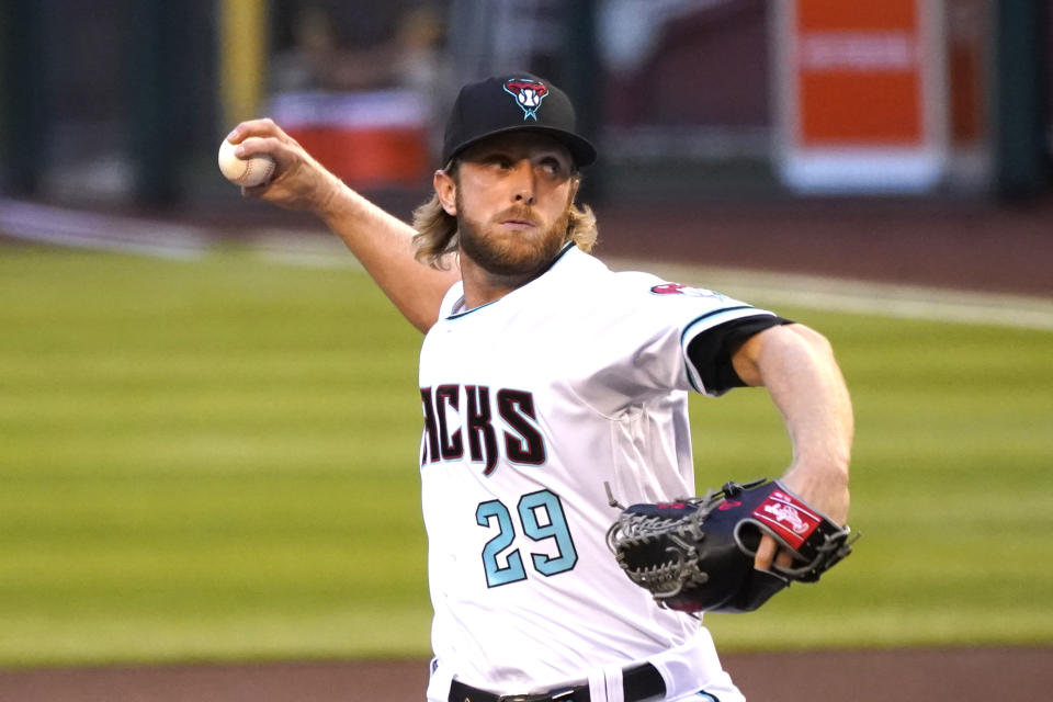 Arizona Diamondbacks pitcher Merrill Kelly throws in the first inning during a baseball game against the San Diego Padres, Friday, Aug 14, 2020, in Phoenix. (AP Photo/Rick Scuteri)