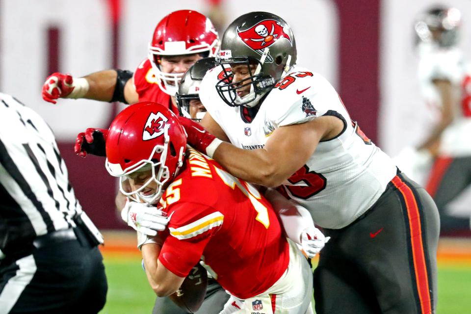 Buccaneers DL Ndamukong Suh (93) sacks Chiefs QB Patrick Mahomes in Super Bowl 55.