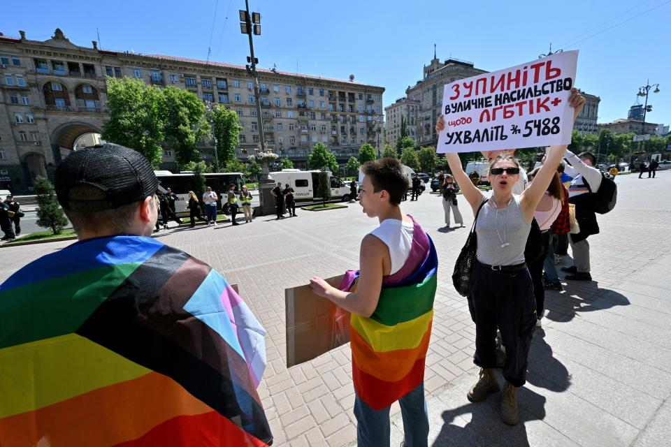 People protest outside Kyiv city hall to demand protection of LGBTQ people's rights during a rally marking the International Day against homophobia, transphobia and biphobia, on May 17, 2024 (AFP via Getty Images)