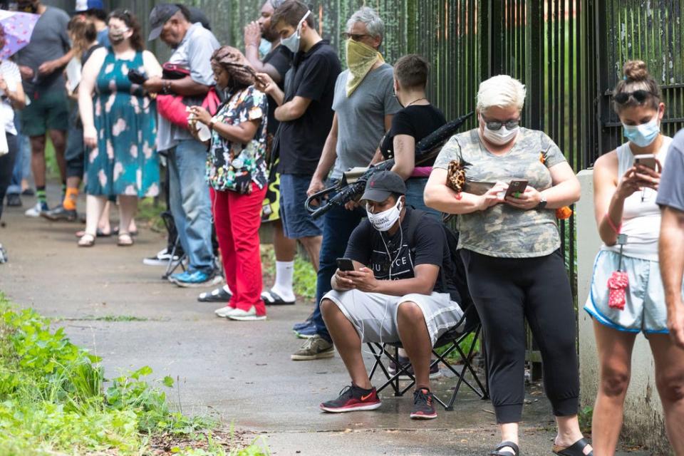 Voters wait in line in Atlanta on June 9, 2020.