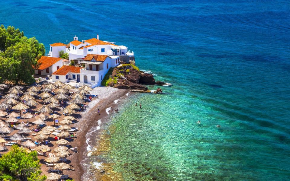 Beautiful beaches of Greece-Vlychos on Hydra island - Shutterstock