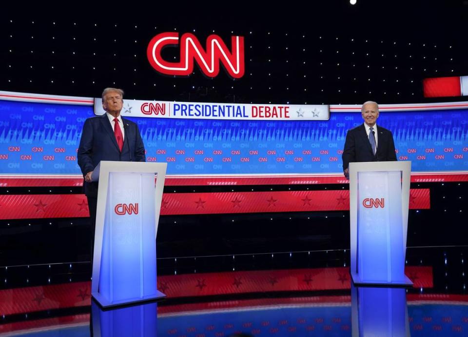 Jun 27, 2024; Atlanta, GA, USA; President Joe Biden and former President Donald Trump, left, during the debate at CNN’s studios in Atlanta. CNN Anchors Jake Tapper and Dana Bash are moderators of the debate. Mandatory Credit: Jack Gruber-USA TODAY