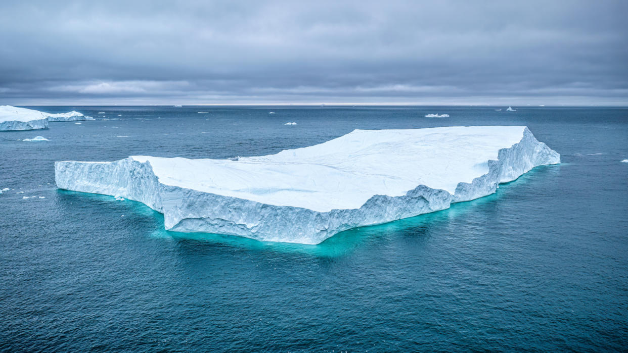  Large iceberg floating in the arctic sea. 