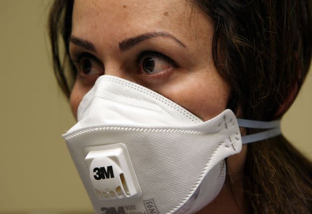 A nurse wears a N95 respiratory mask during a training session April 28, 2009 in Oakland, California during the height of the Swine Flu outbreak.