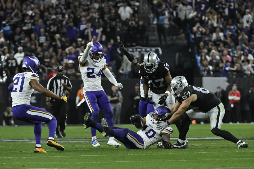 Minnesota Vikings linebacker Ivan Pace Jr. (40) intercepts a pass intended for Las Vegas Raiders tight end Michael Mayer (87) during the second half of an NFL football game, Sunday, Dec. 10, 2023, in Las Vegas. (AP Photo/David Becker)