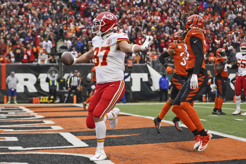 Kansas City Chiefs tight end Travis Kelce (87) celebrates after a 9-yard touchdown during the first half of an NFL football game against the Cincinnati Bengals, Sunday, Jan. 2, 2022, in Cincinnati. (AP Photo/Jeff Dean)