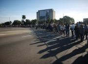 People stand in line to pay tribute to Cuba's late President Fidel Castro in Revolution Square in Havana, Cuba, November 28, 2016. REUTERS/Alexandre Meneghini